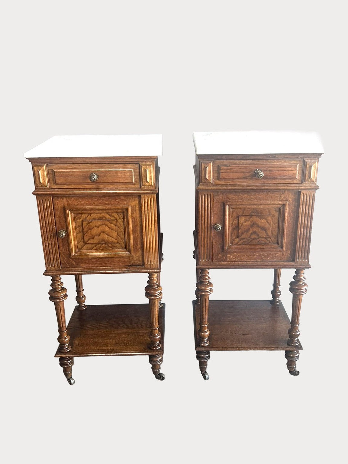 Pair of French Oak Nightstands with White Marble Tops