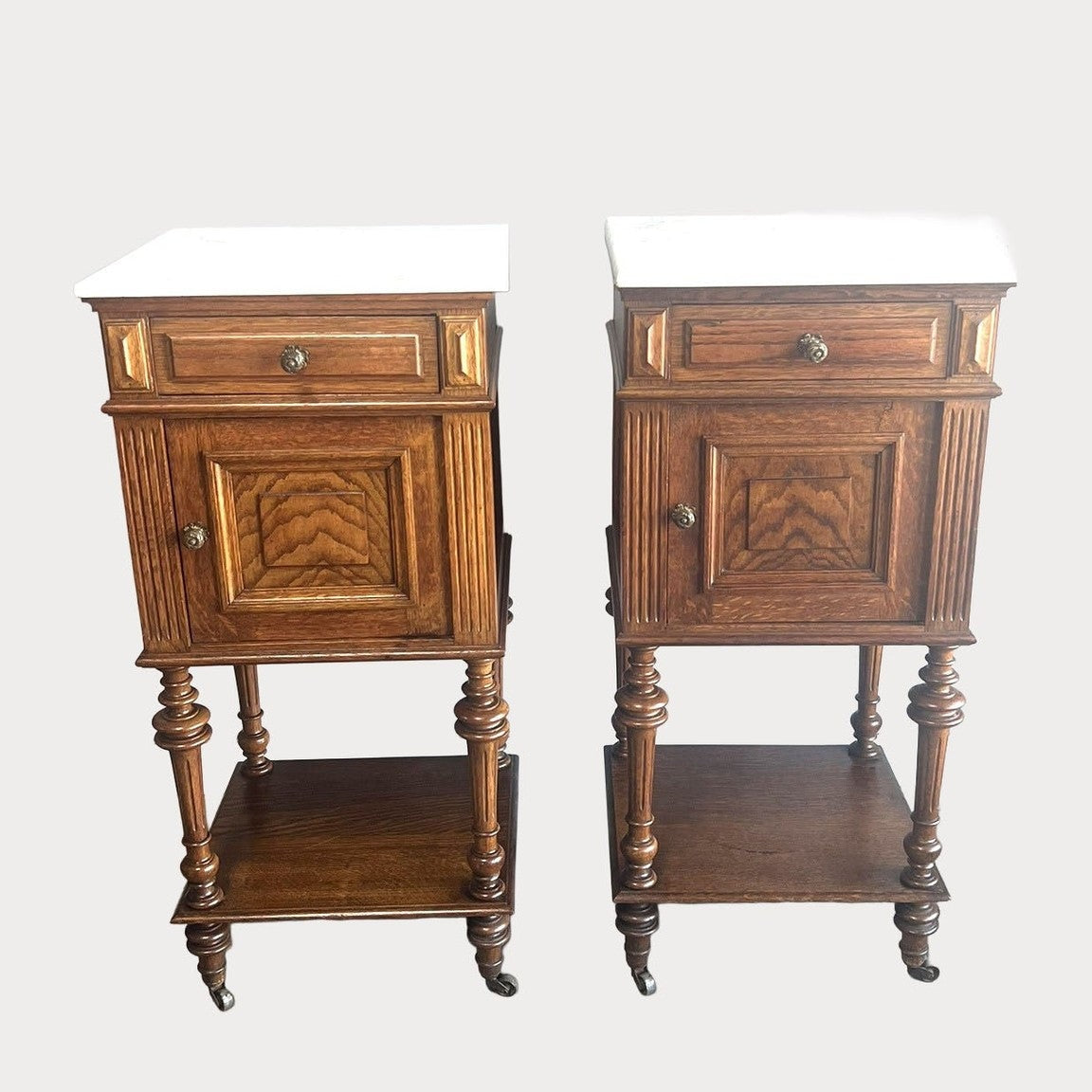 Pair of French Oak Nightstands with White Marble Tops