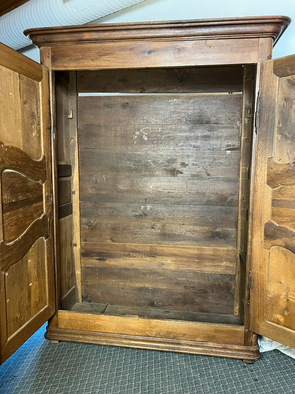 Early 19th-Century French Provincial Solid Oak Armoire